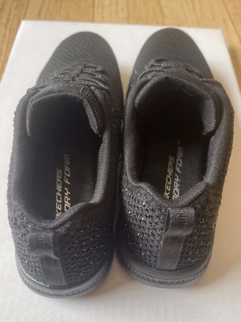 Skechers Women's Black Slip-On Knit Sneakers - Picture 3 of 8